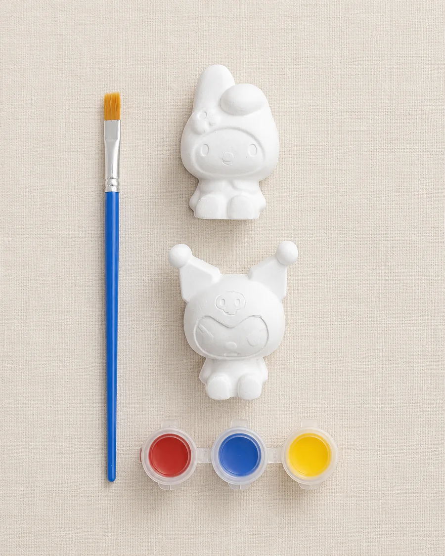 Kit con dos figuras de fantasía de yeso, pincel y pinturas roja, azul y amarilla
